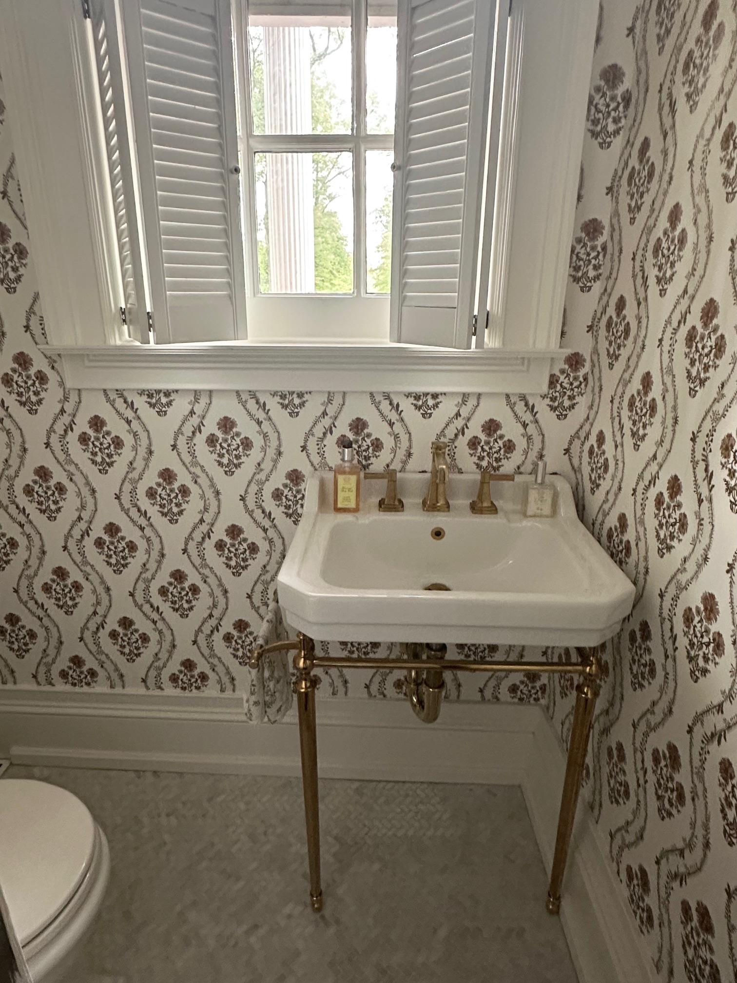 Help me with the finishing touches on this tiny little powder room!